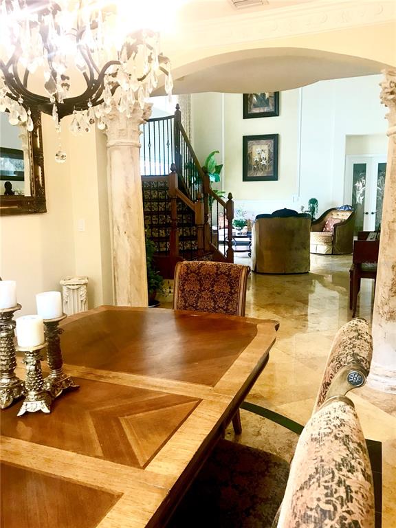 9543 Campi Drive Lake Worth, FL 33467 - Photo 11 of 23 a living room with furniture and a flat screen tv