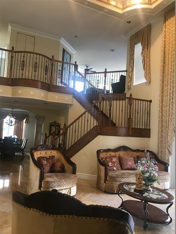 9543 Campi Drive Lake Worth, FL 33467 - Photo 3 of 23 a living room with furniture