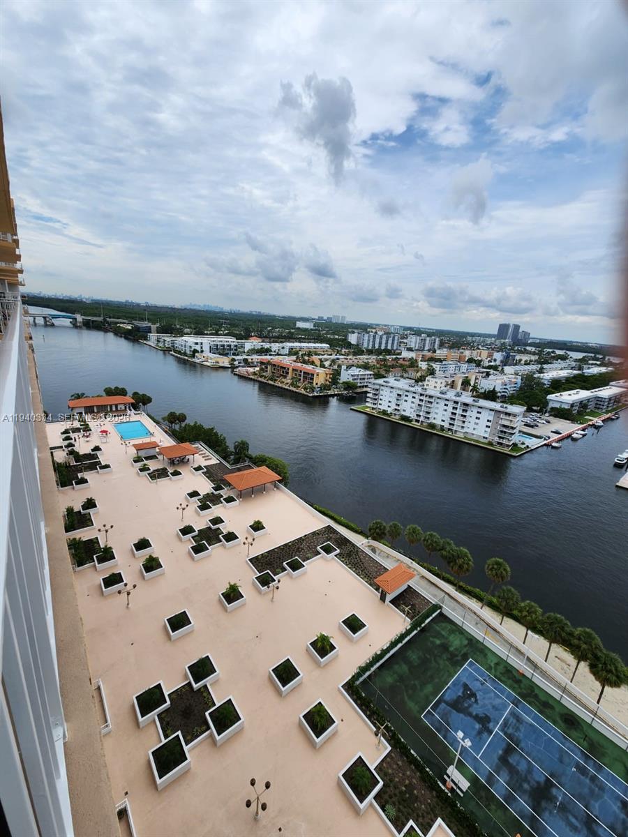 290 174th Street, Unit 1908 Sunny Isles Beach, FL 33160 - Photo 10 of 29 an aerial view of a ocean beach