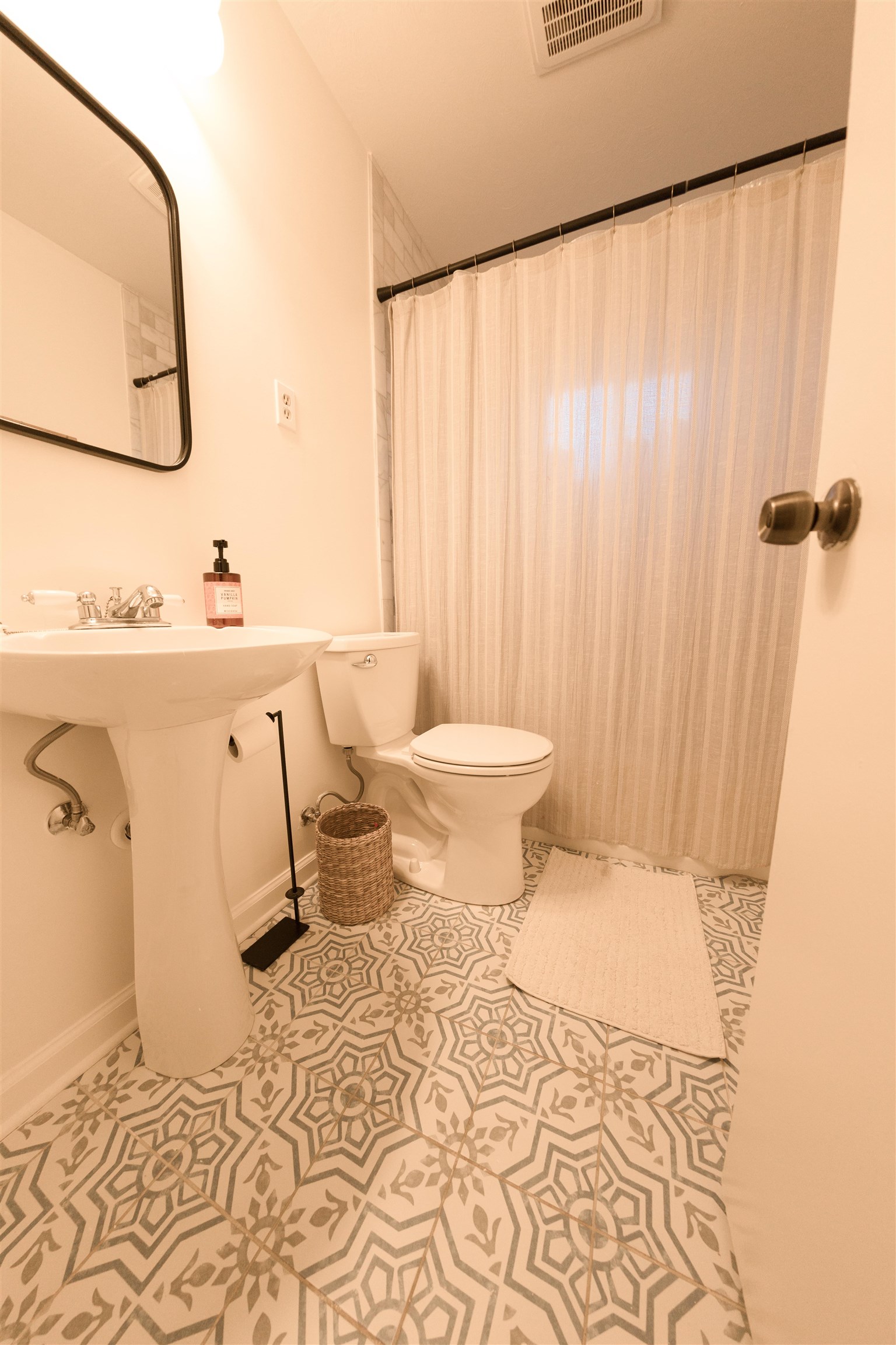 5431 Quince Road Memphis, TN 38119 - Photo 16 of 21 a bathroom with a sink toilet and shower