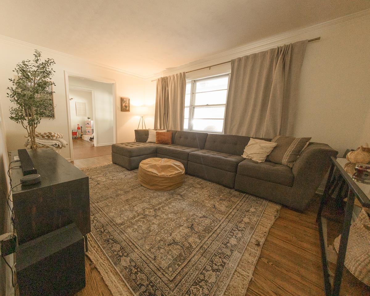 5431 Quince Road Memphis, TN 38119 - Photo 4 of 21 a living room with furniture and a couch