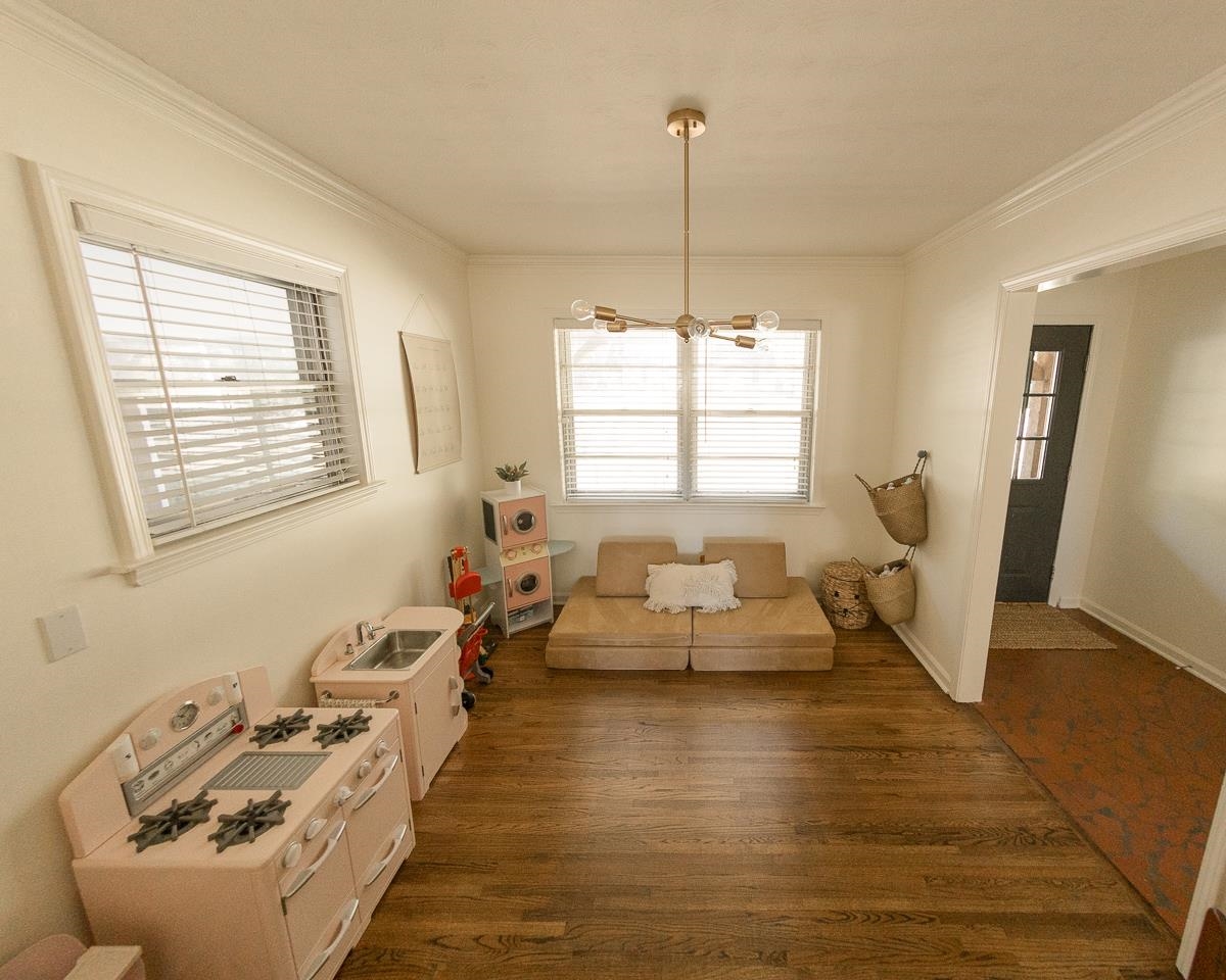 5431 Quince Road Memphis, TN 38119 - Photo 5 of 21 a living room with furniture or window and a wooden floor
