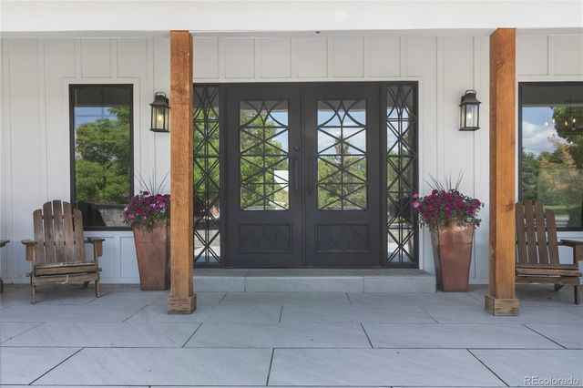 a front view of a house with a porch