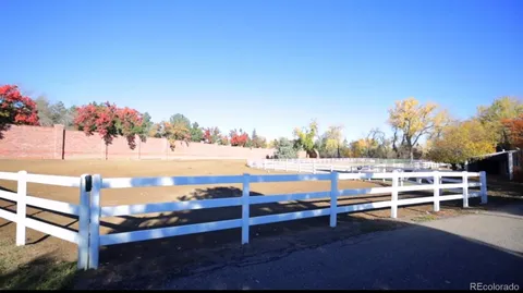 an aerial view of houses with outdoor space