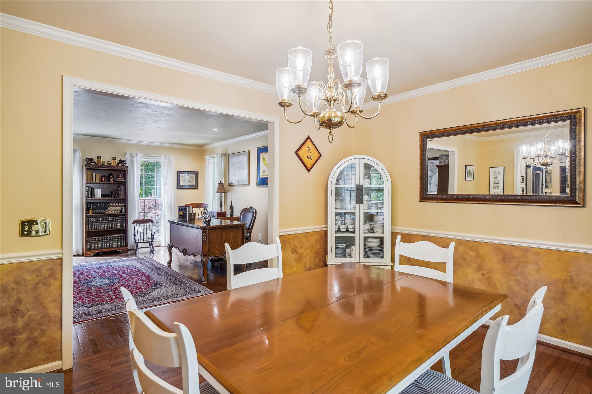 24709 Kings Valley Road Damascus, MD 20872 - Photo 17 of 110 Dining Room with hardwoods, crown & chair molding