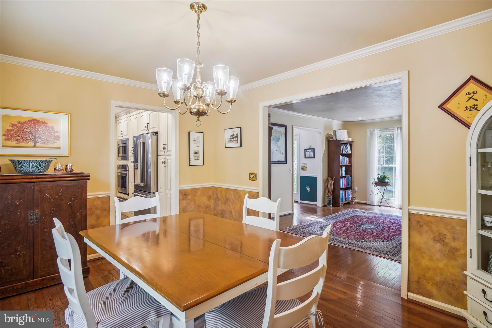 24709 Kings Valley Road Damascus, MD 20872 - Photo 19 of 110 Dining Room with hardwoods, crown & chair molding