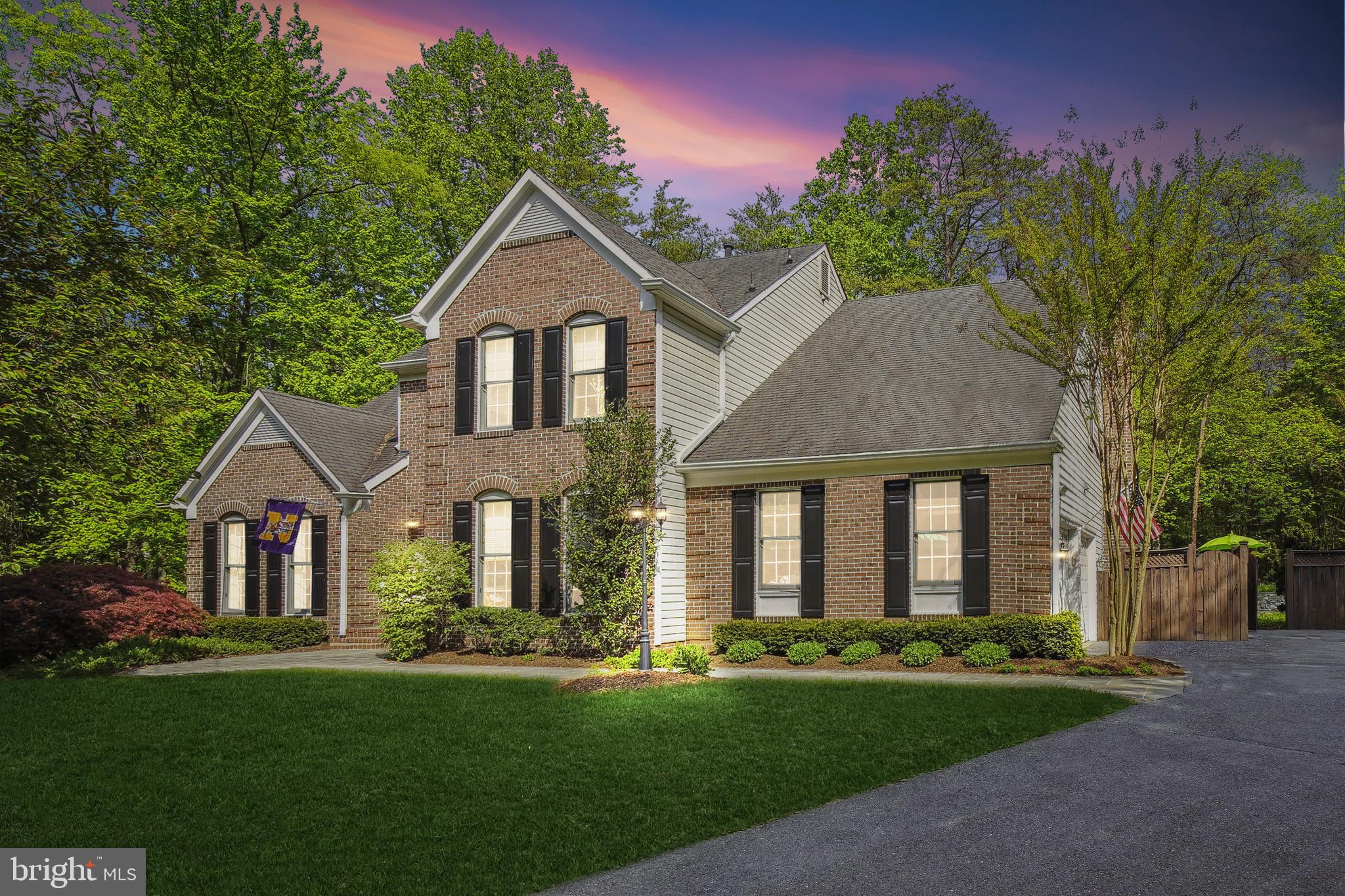 24709 Kings Valley Road Damascus, MD 20872 - Photo 2 of 110 Front of the home with brick front - twilight