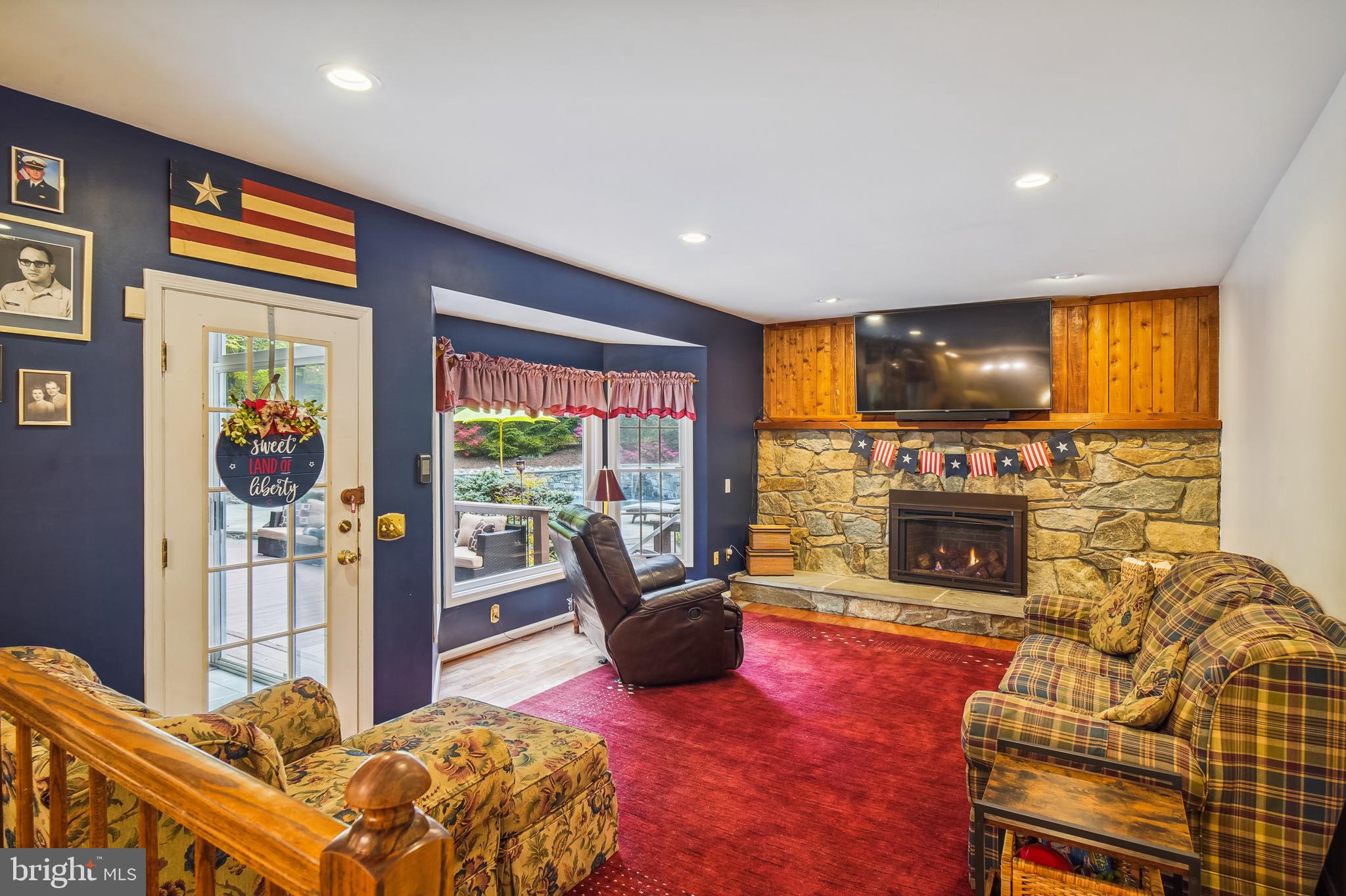 24709 Kings Valley Road Damascus, MD 20872 - Photo 31 of 110 Family Room with Stone Wall & Gas Fireplace
