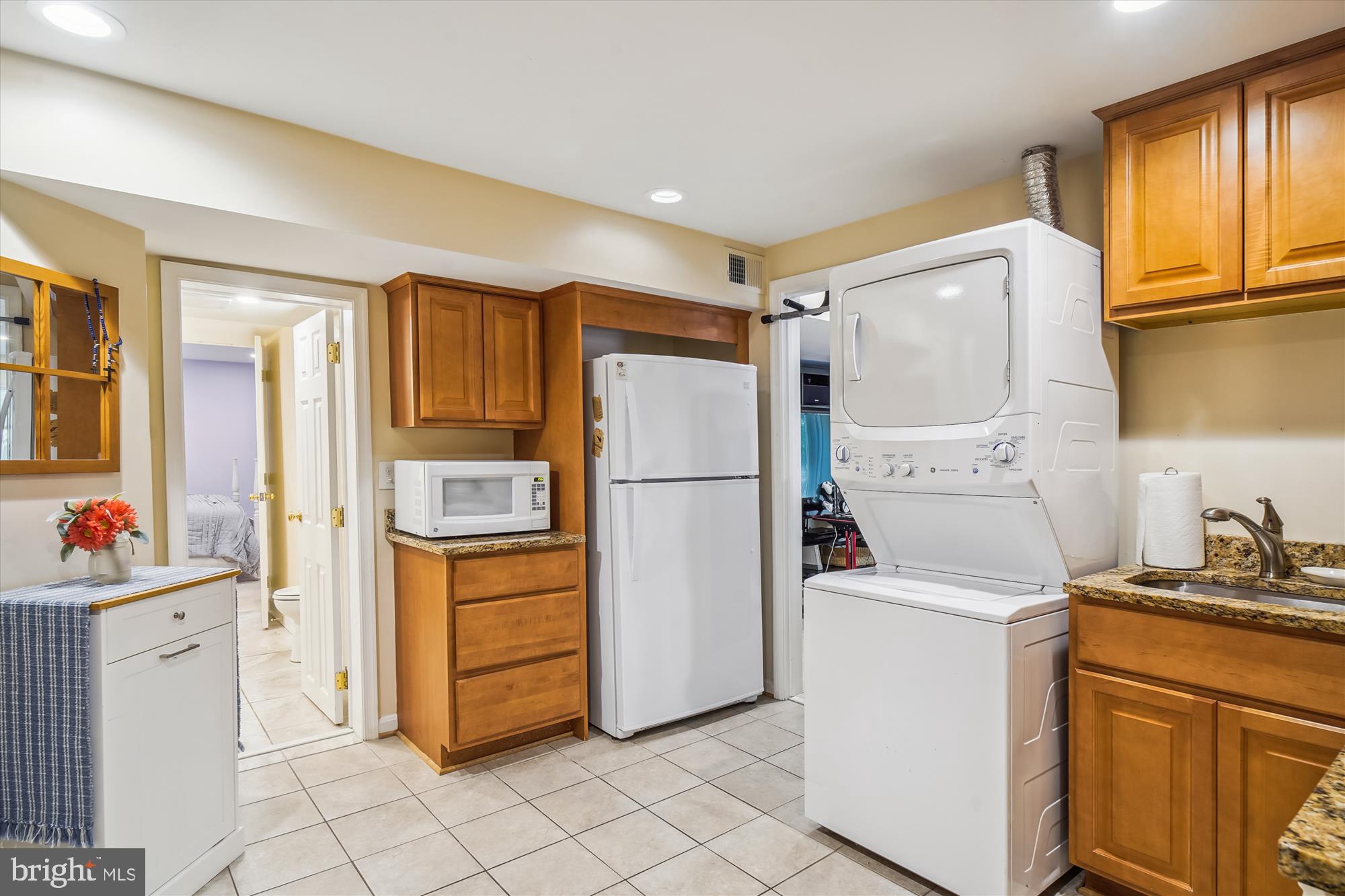 24709 Kings Valley Road Damascus, MD 20872 - Photo 53 of 110 Lower Level 2nd Kitchen with Washer and Dryer