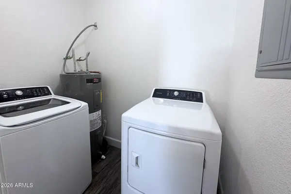 a utility room with dryer and washer