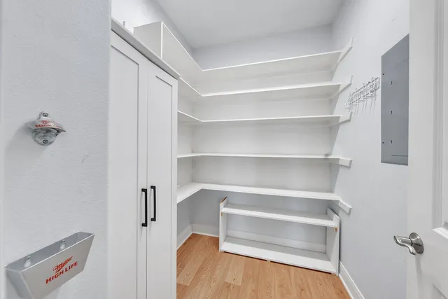 a view of a bathroom from the hallway