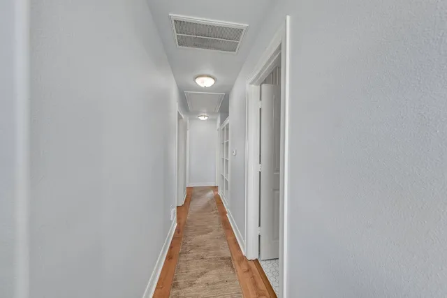 a view of an empty walk in closet