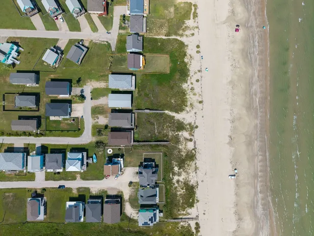 a view of a city with lawn chairs