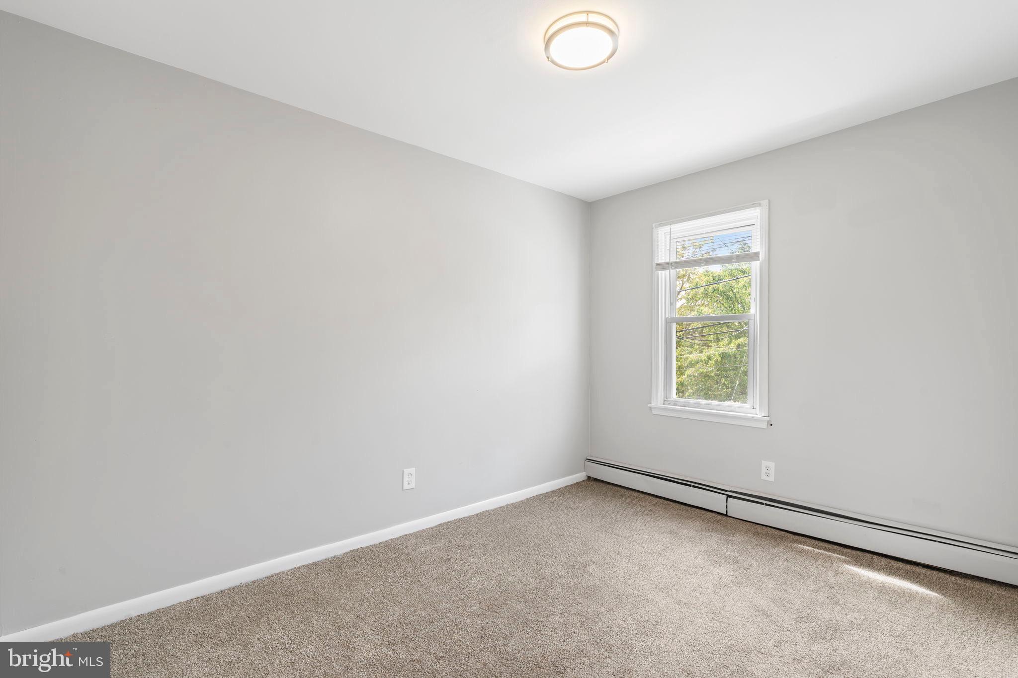 1363 Green Street Marcus Hook, PA 19061 - Photo 19 of 26 an empty room with a window