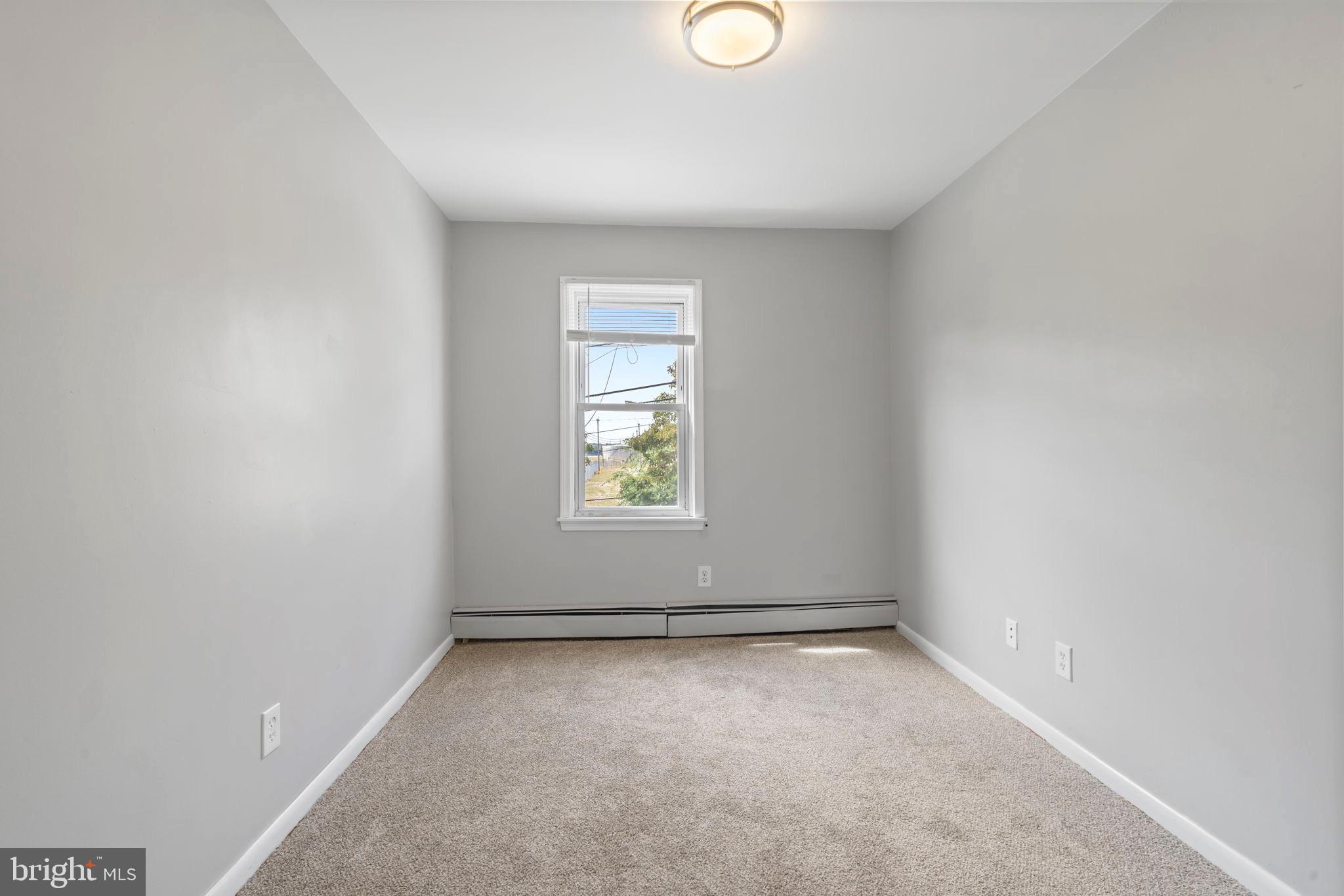 1363 Green Street Marcus Hook, PA 19061 - Photo 20 of 26 an empty room with a window