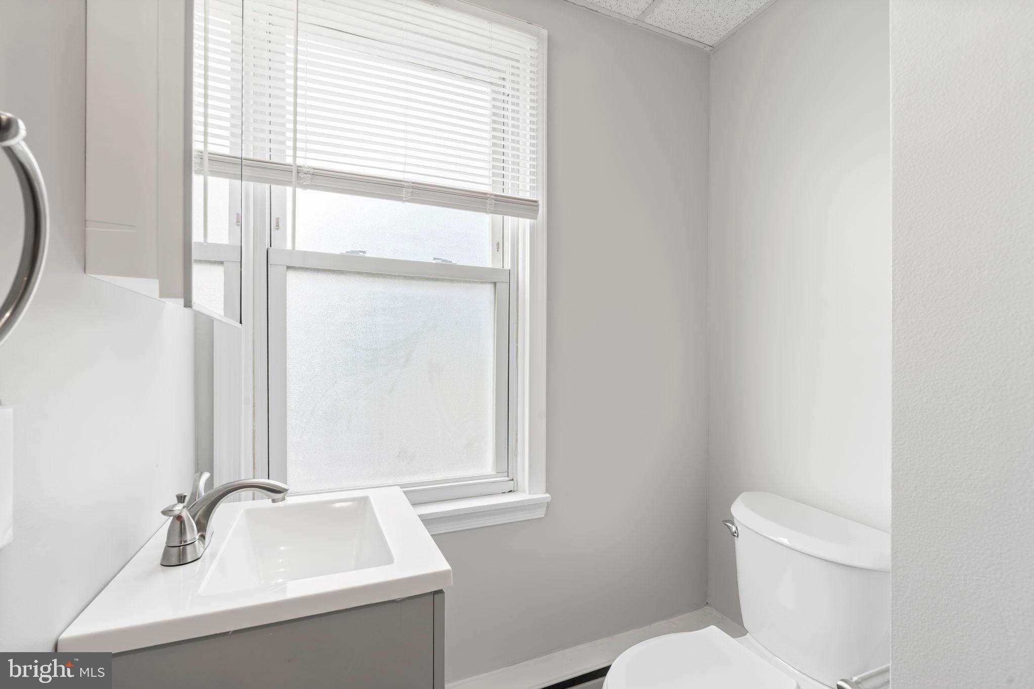 1363 Green Street Marcus Hook, PA 19061 - Photo 22 of 26 a bathroom with a sink and a toilet