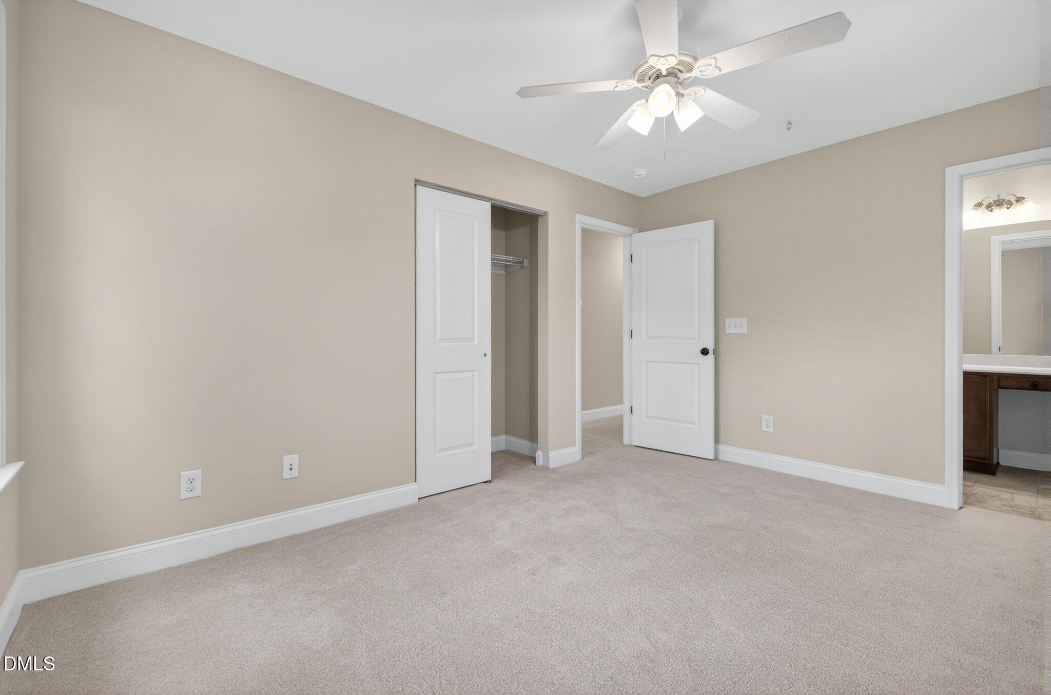 1304 Barnford Mill Road Wake Forest, NC 27587 - Photo 35 of 44 an empty room with a ceiling fan and a window
