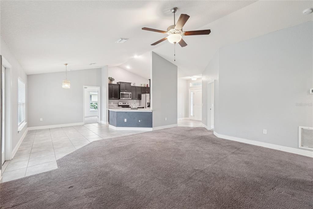5134 Jenson Avenue Spring Hill, FL 34608 - Photo 12 of 49 a view of a kitchen with a sink and a stove top oven