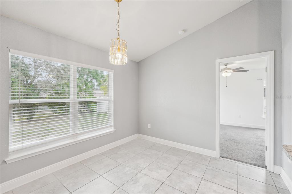 5134 Jenson Avenue Spring Hill, FL 34608 - Photo 17 of 49 a view of an empty room with a window