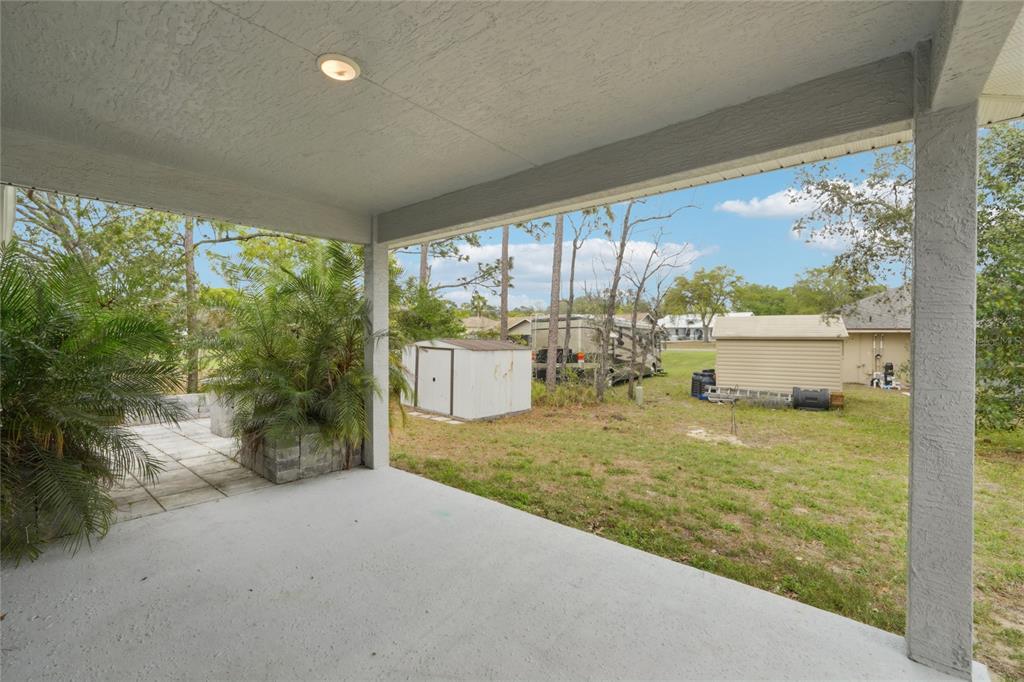 5134 Jenson Avenue Spring Hill, FL 34608 - Photo 36 of 49 a view of back yard from a balcony