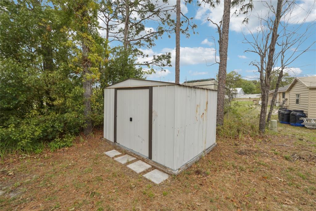 5134 Jenson Avenue Spring Hill, FL 34608 - Photo 37 of 49 a view of a backyard