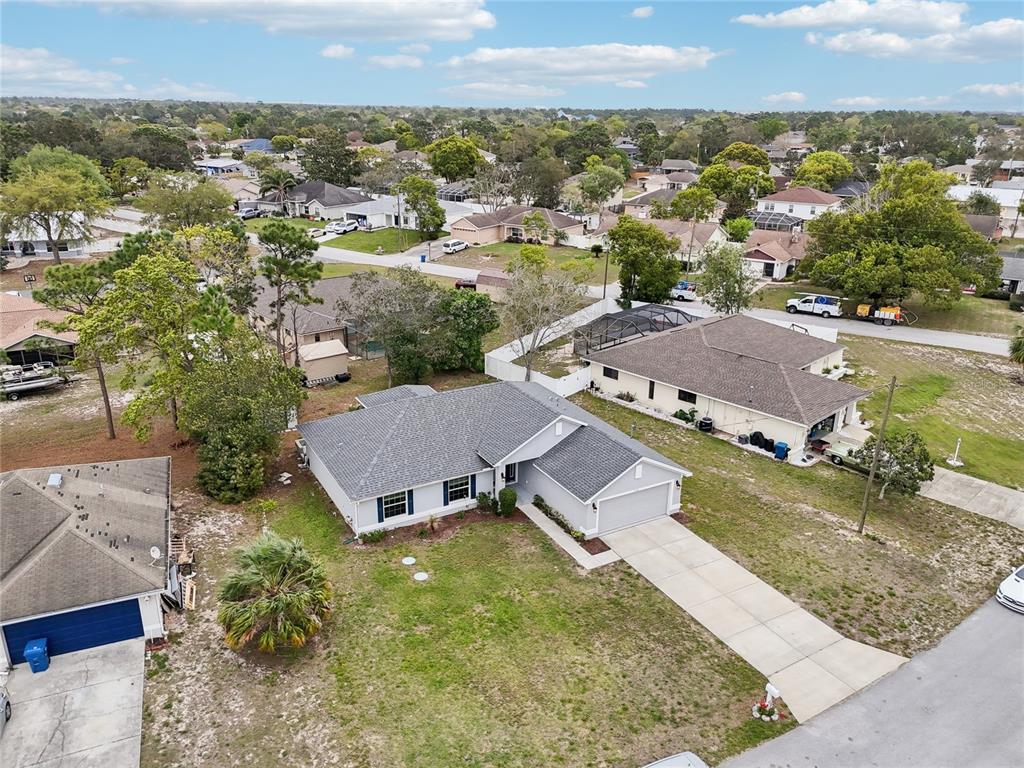 5134 Jenson Avenue Spring Hill, FL 34608 - Photo 39 of 49 an aerial view of residential houses with outdoor space and a sink