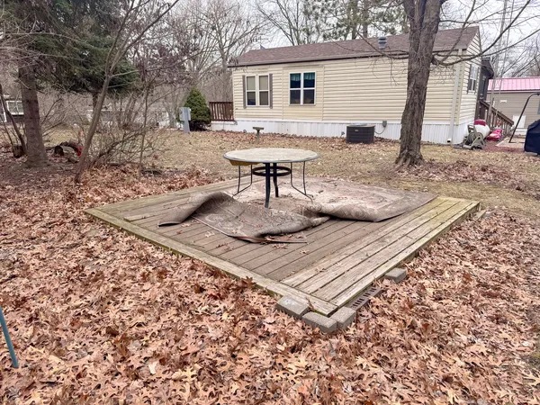 a view of a backyard of a house