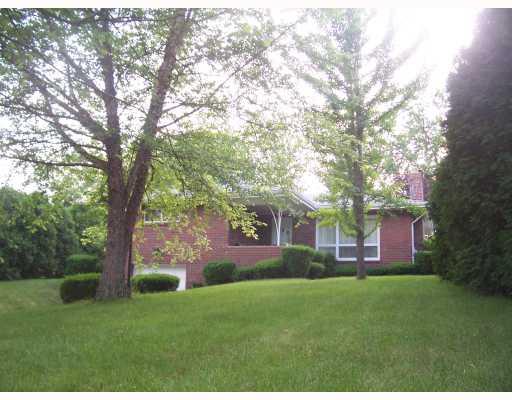 2443 Haymaker Road Monroeville, PA 15146 - Photo 1 of 9 Exterior Front. Great Brick Ranch on beautifully land-scaped lot with mature trees.