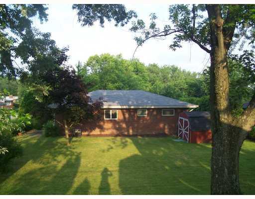 2443 Haymaker Road Monroeville, PA 15146 - Photo 2 of 9 Exterior Back. Lovely and spacious back yard. Perfect for family get-togethers, BBQ s. Plenty of space for the kids or animals to run and play.