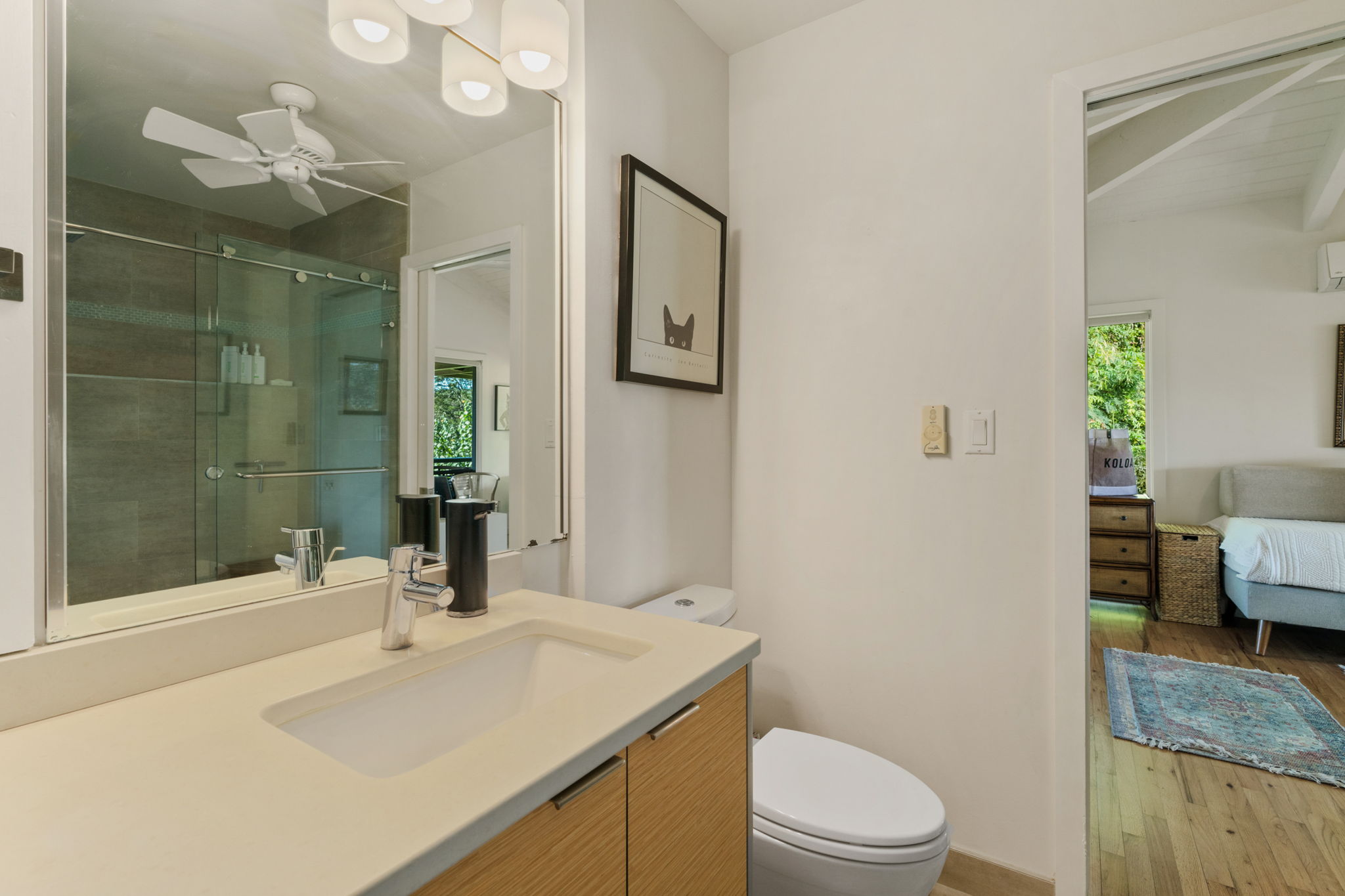 3707 Omao Road Koloa, HI 96756 - Photo 12 of 27 a bathroom with a sink a toilet and shower