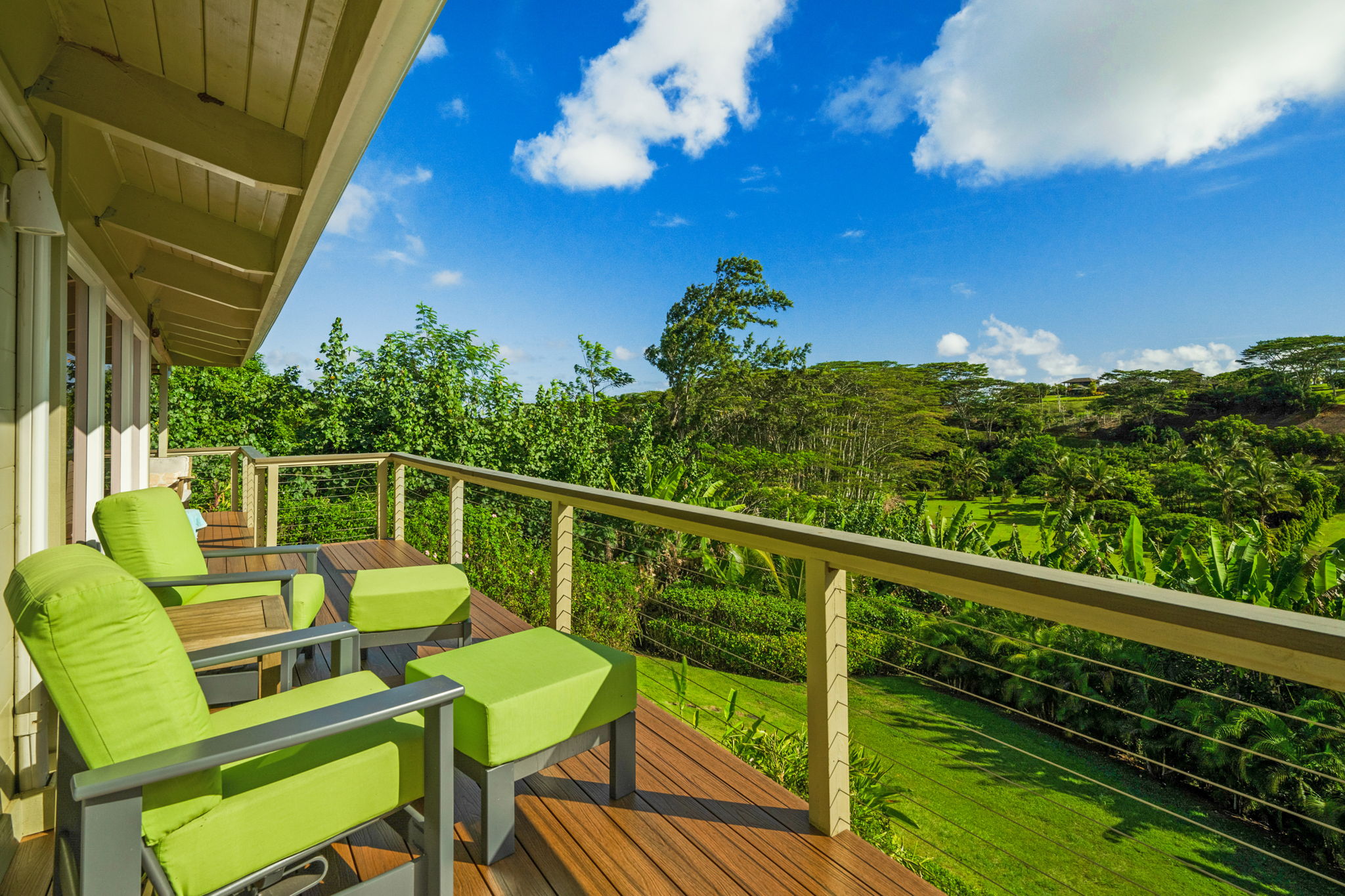3707 Omao Road Koloa, HI 96756 - Photo 22 of 27 a view of a chairs and table in patio