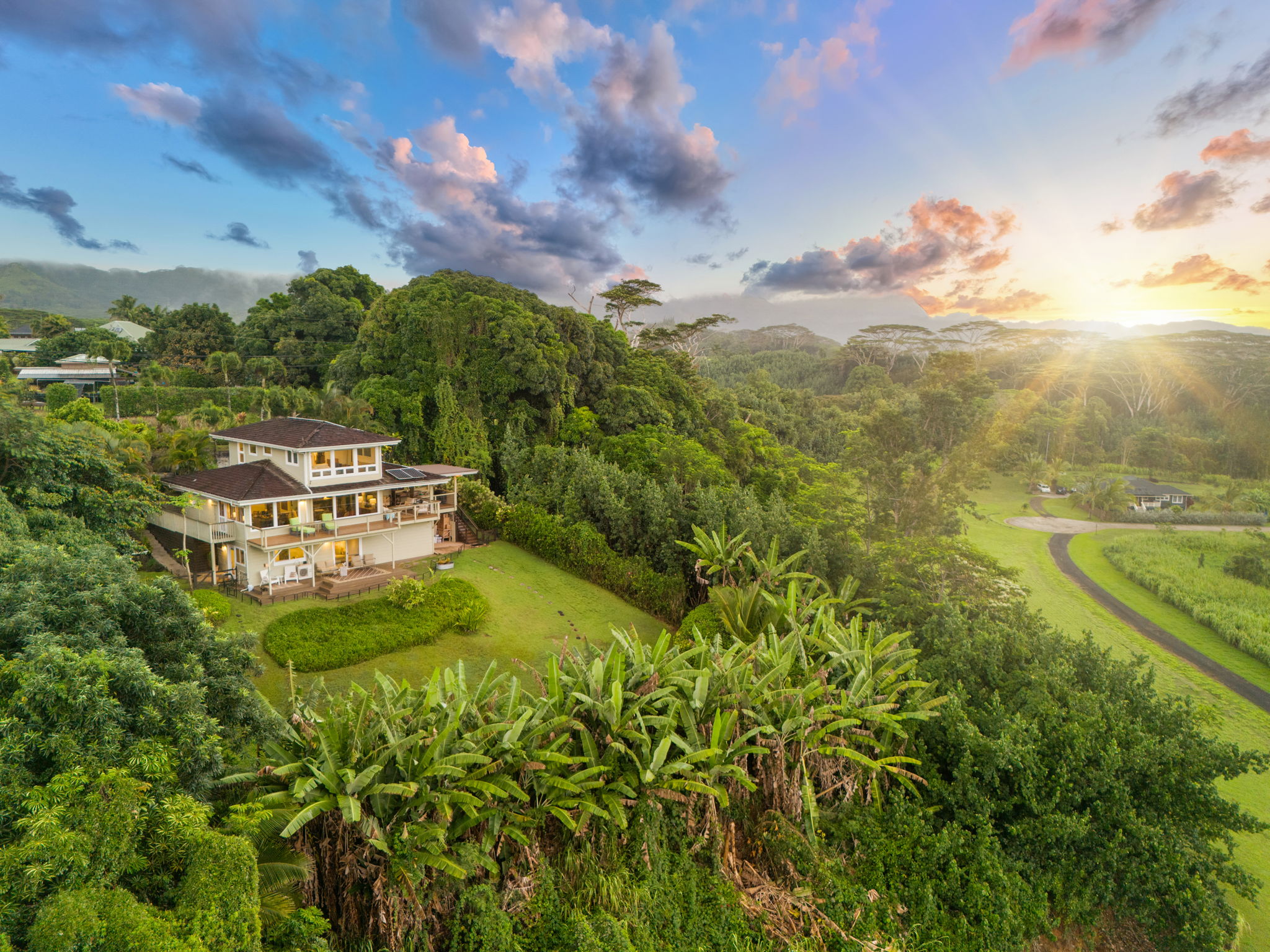3707 Omao Road Koloa, HI 96756 - Photo 24 of 27 a aerial view of a house with pool garden and mountain view in back