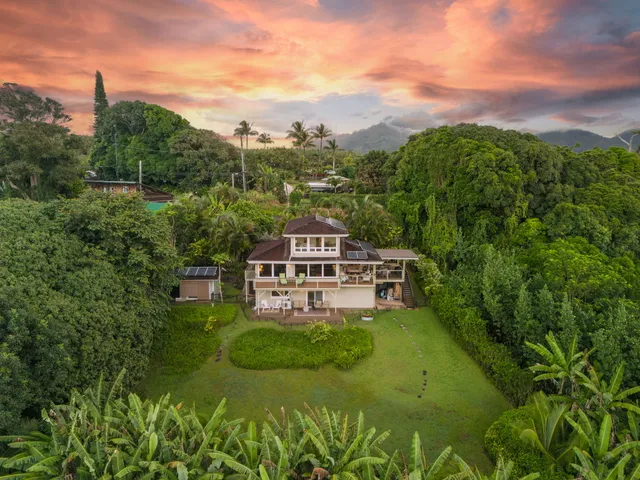 a view of a house with a big yard