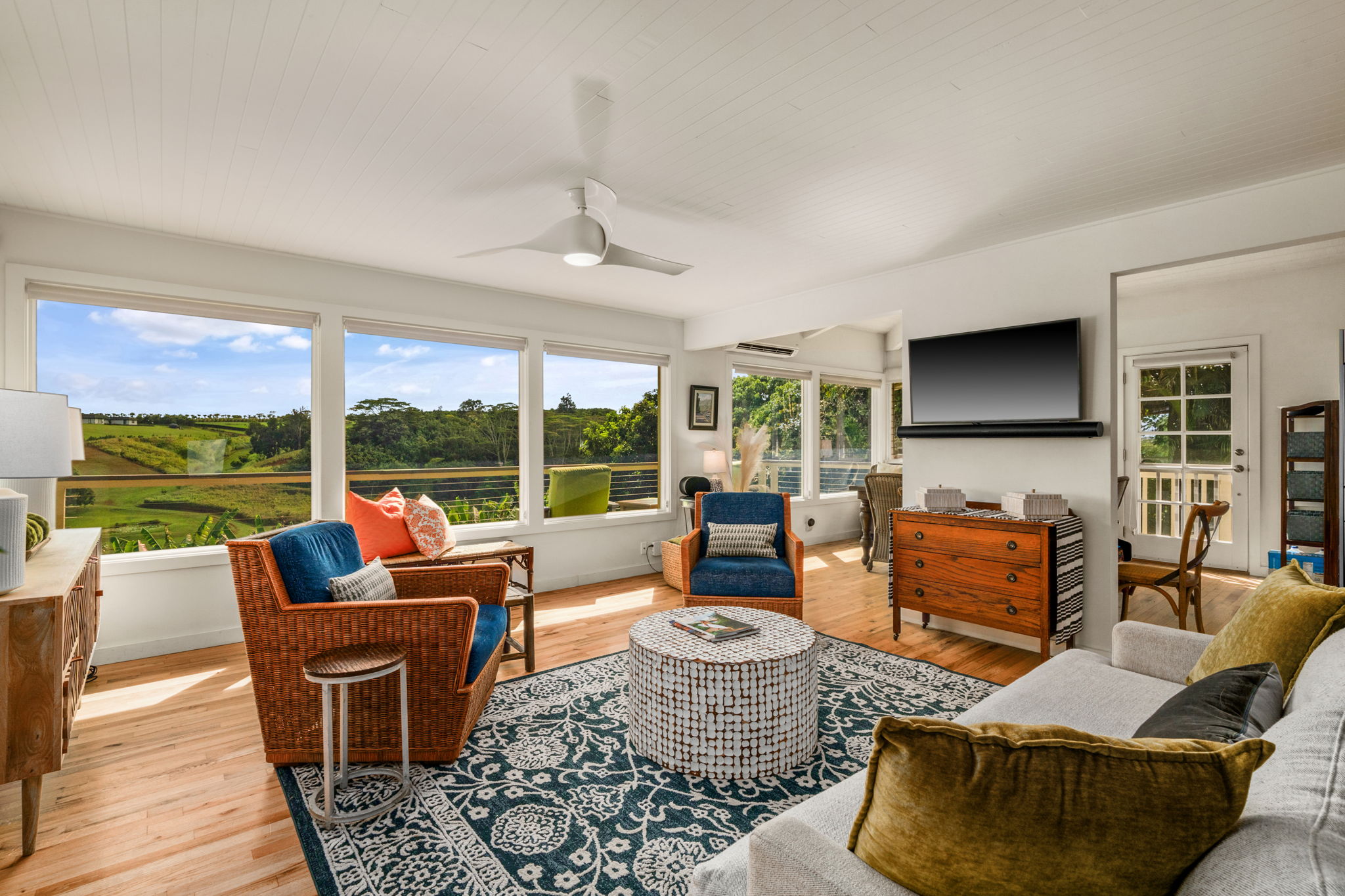3707 Omao Road Koloa, HI 96756 - Photo 3 of 27 a living room with furniture and a large window