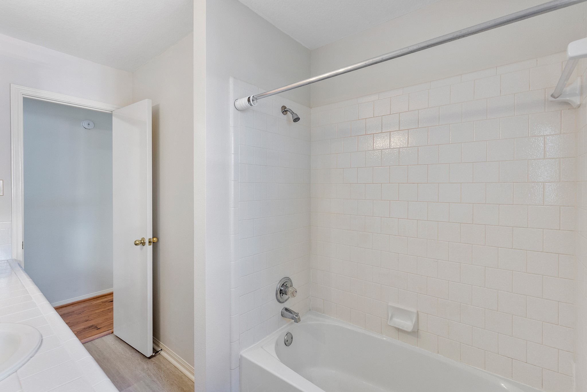 8018 Holiday Lane Houston, TX 77075 - Photo 28 of 42 a bathroom with a bathtub and a shower