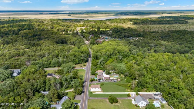 a backyard of a house with outdoor seating and green space