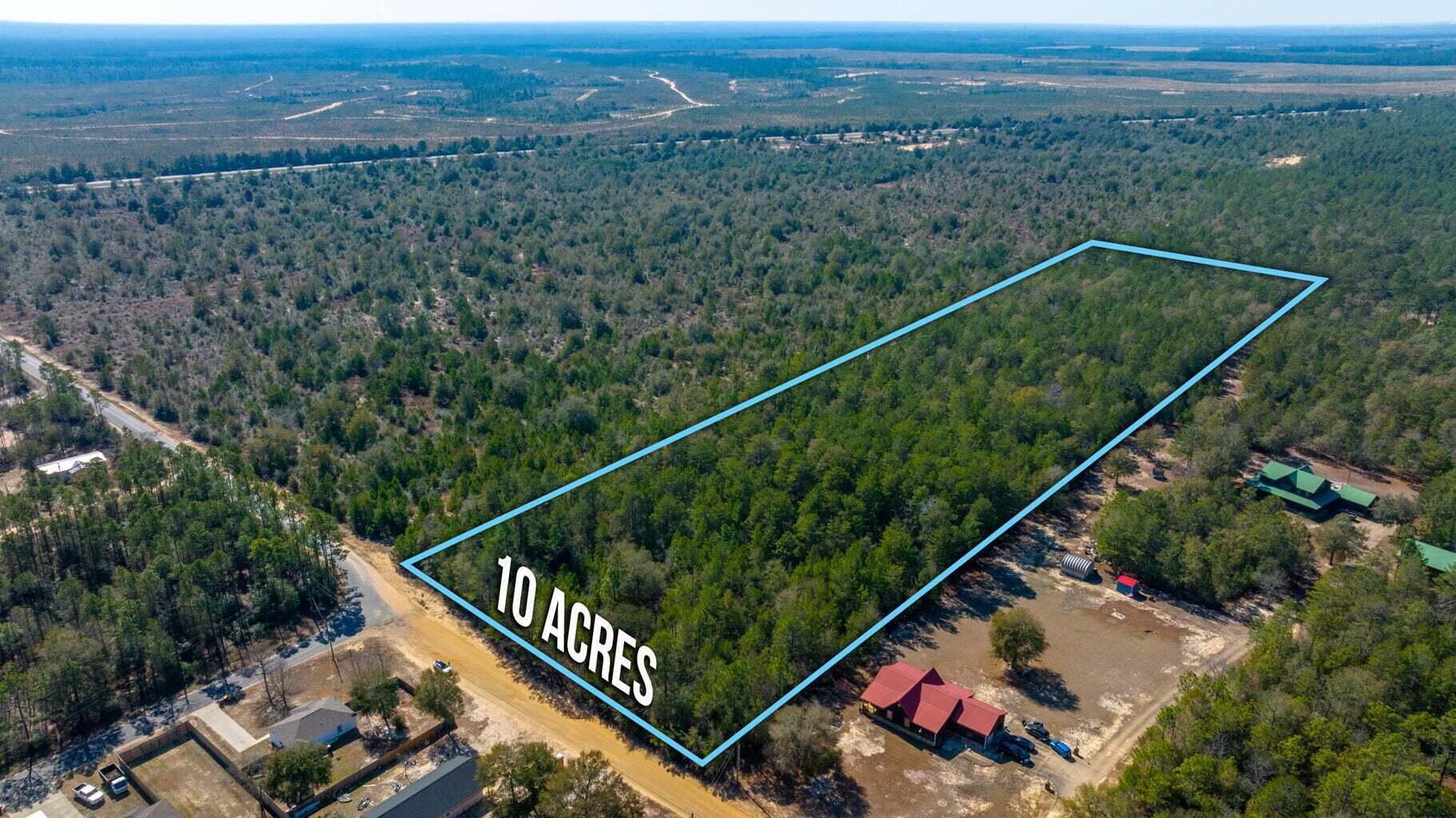 10-acres Colt Drive Crestview, FL 32539 - Photo 7 of 9 a view of a balcony with a forest