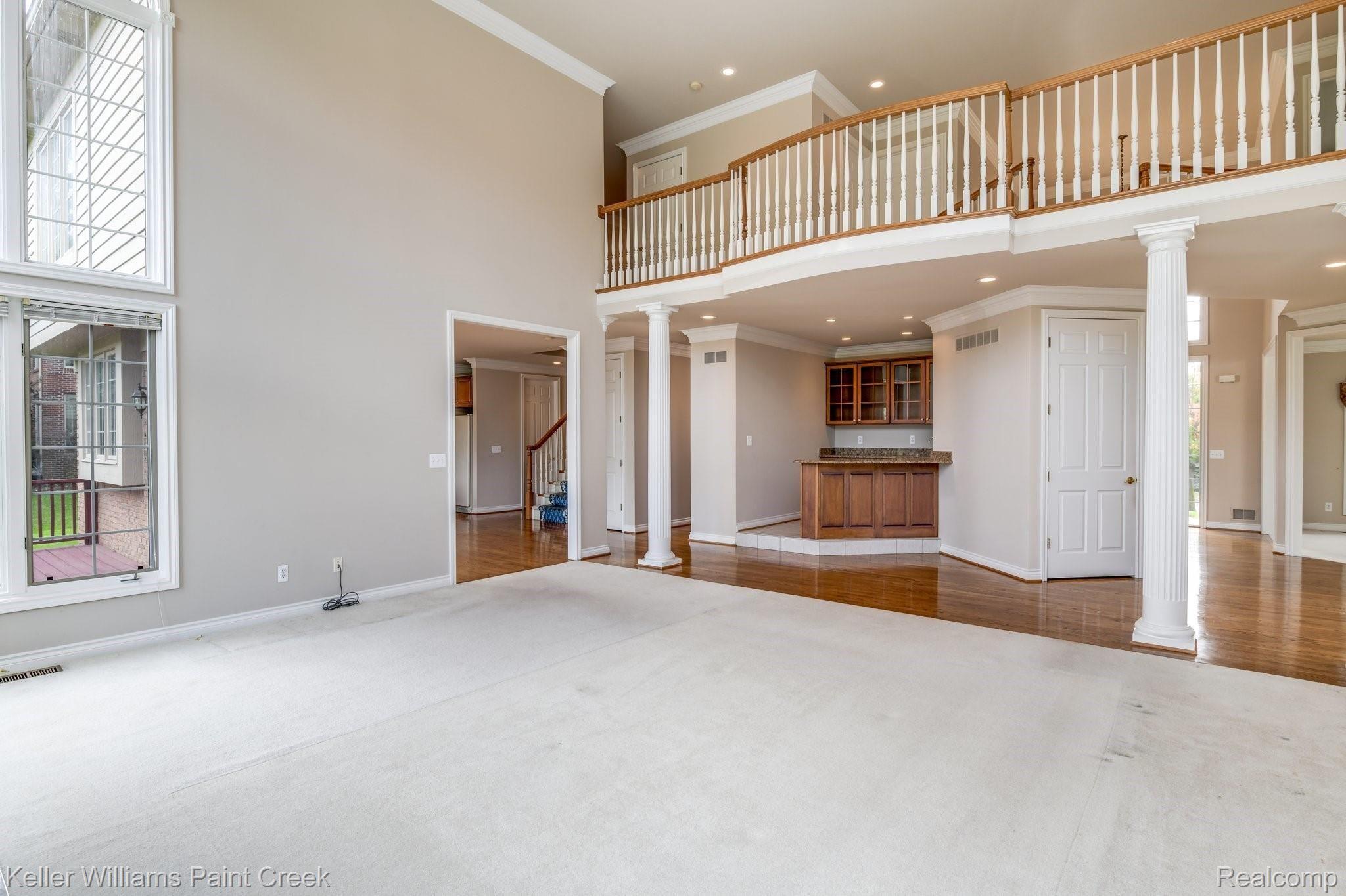 1163 Autumnview Drive Rochester, MI 48307 - Photo 8 of 34 The spacious second floor balcony overlooks the 2-story great room!