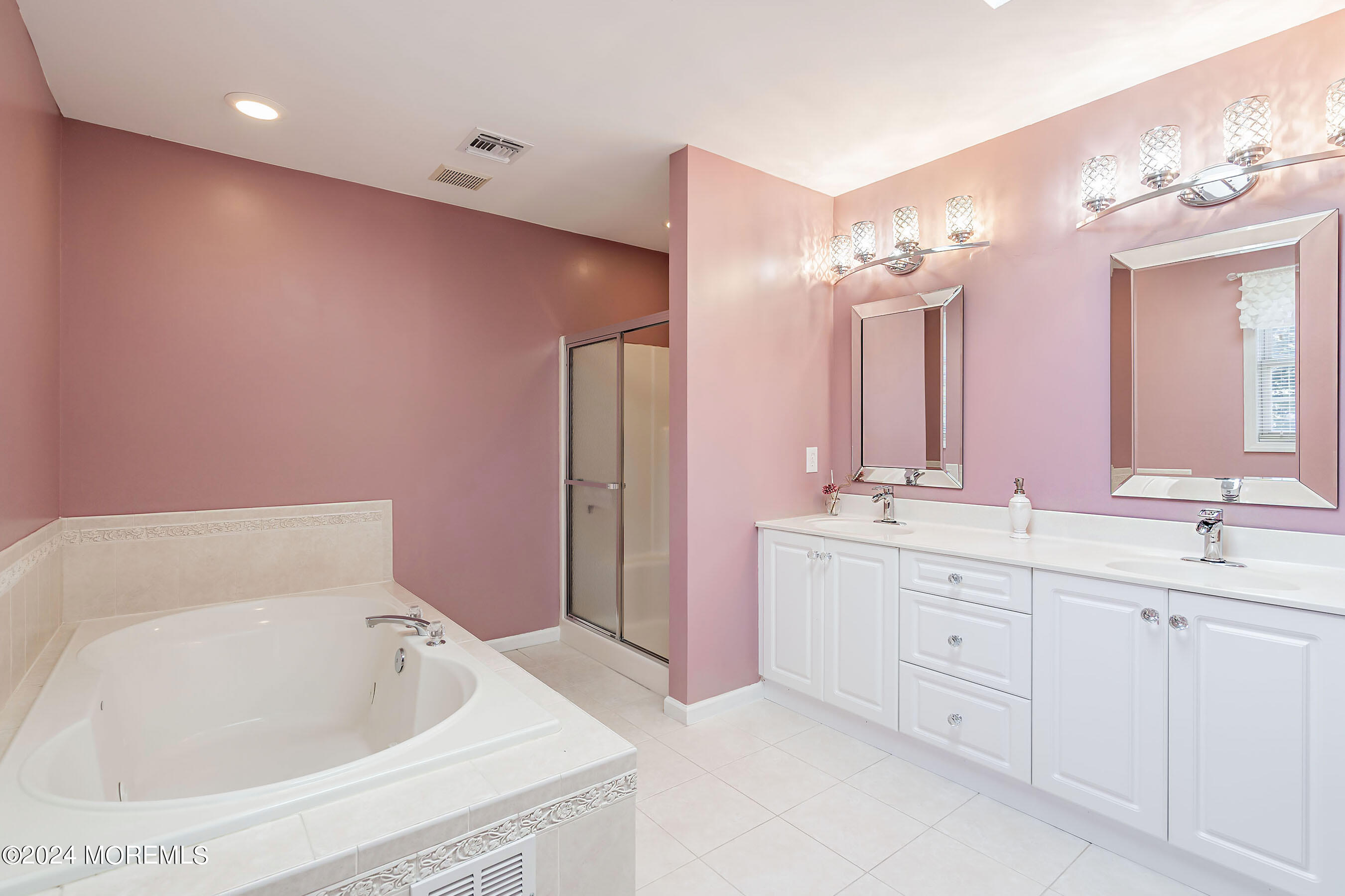 1415 Dorset Dock Road Point Pleasant, NJ 08742 - Photo 14 of 27 a bathroom with a bathtub sink and mirror