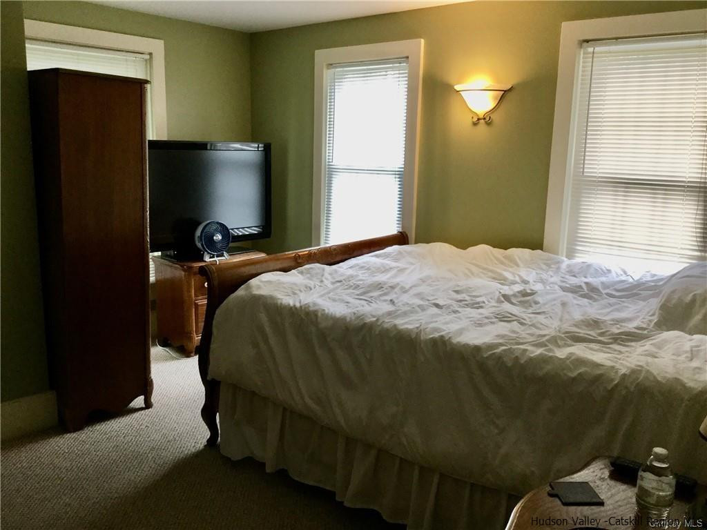 23 Bruyn Turnpike Wallkill, NY 12589 - Photo 14 of 19 a bedroom with a bed and a dresser
