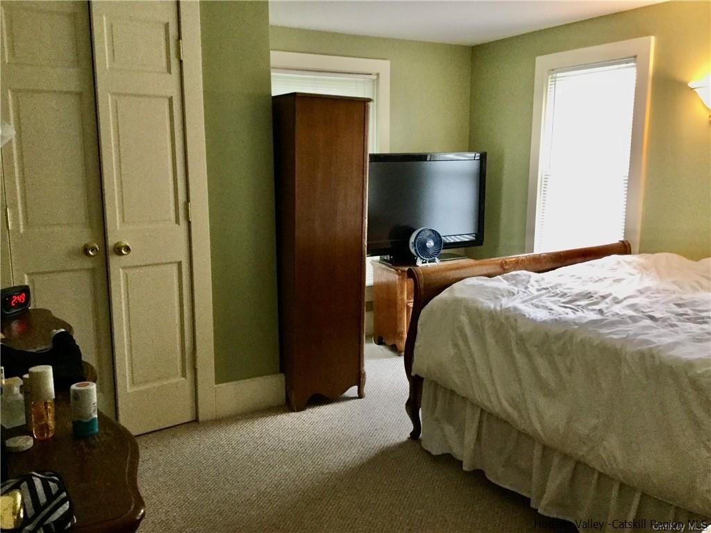 23 Bruyn Turnpike Wallkill, NY 12589 - Photo 15 of 19 a bedroom with a bed and a flat screen tv