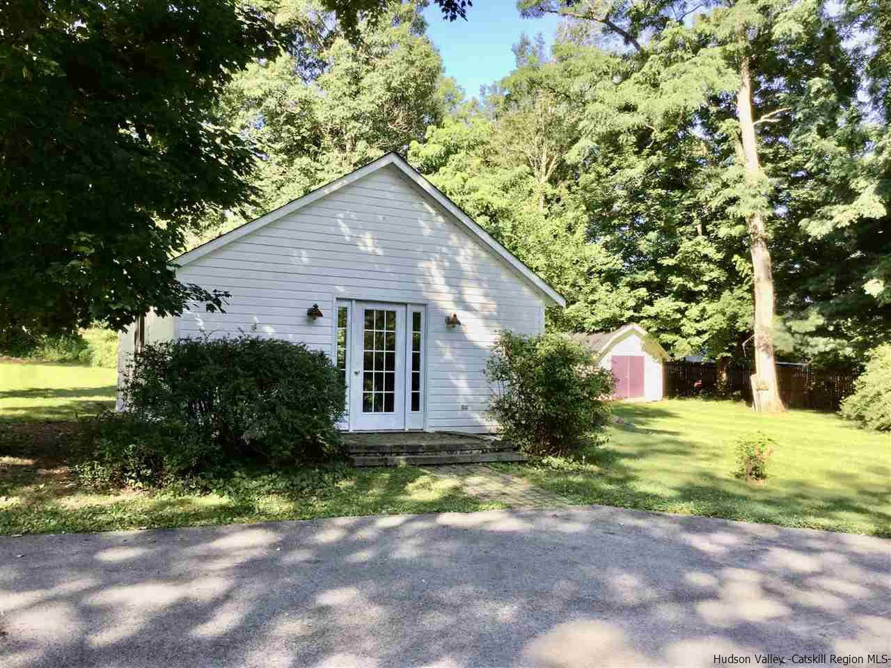 23 Bruyn Turnpike Wallkill, NY 12589 - Photo 17 of 19 a house that has a tree in front of it