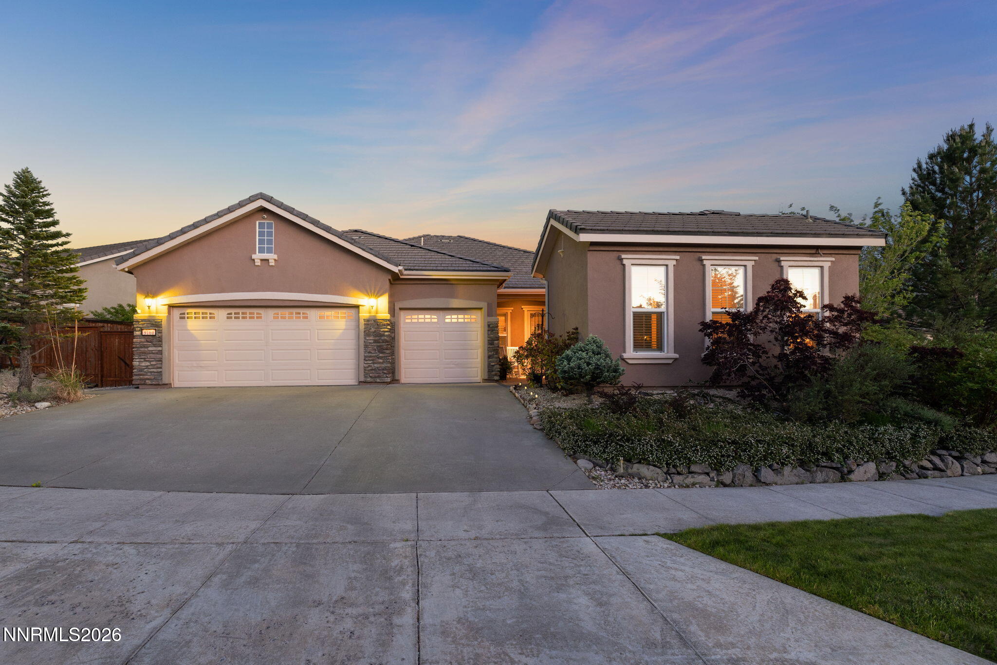 9160 Quilberry Way Reno, NV 89523 - Photo 1 of 53 a front view of a house with garden