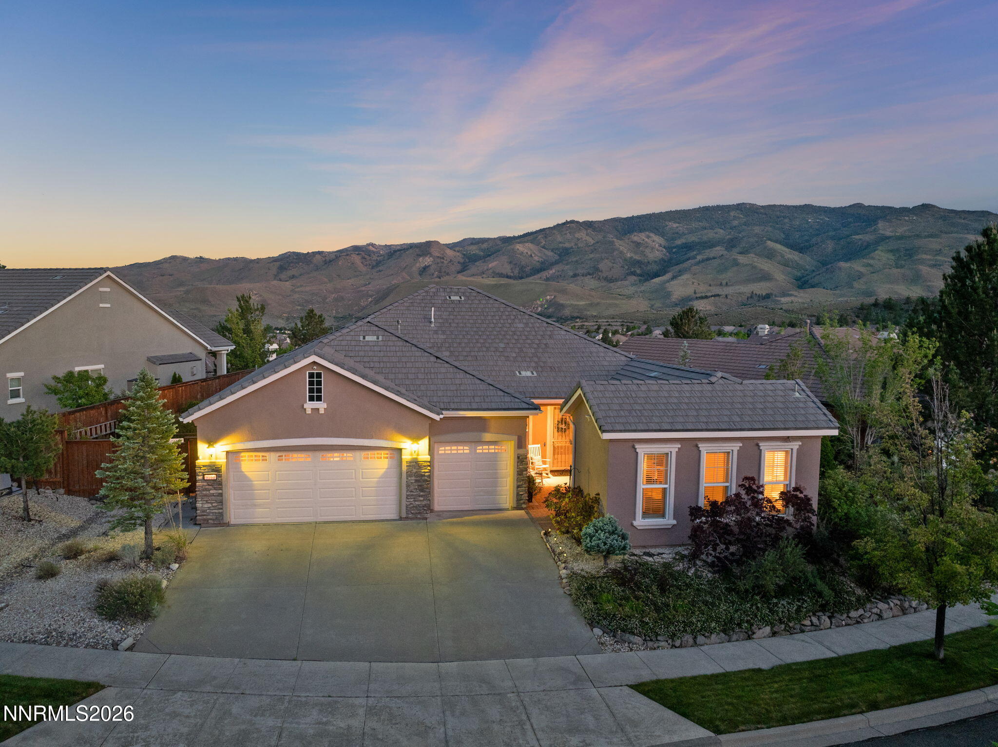 9160 Quilberry Way Reno, NV 89523 - Photo 13 of 53 a front view of a house with a yard