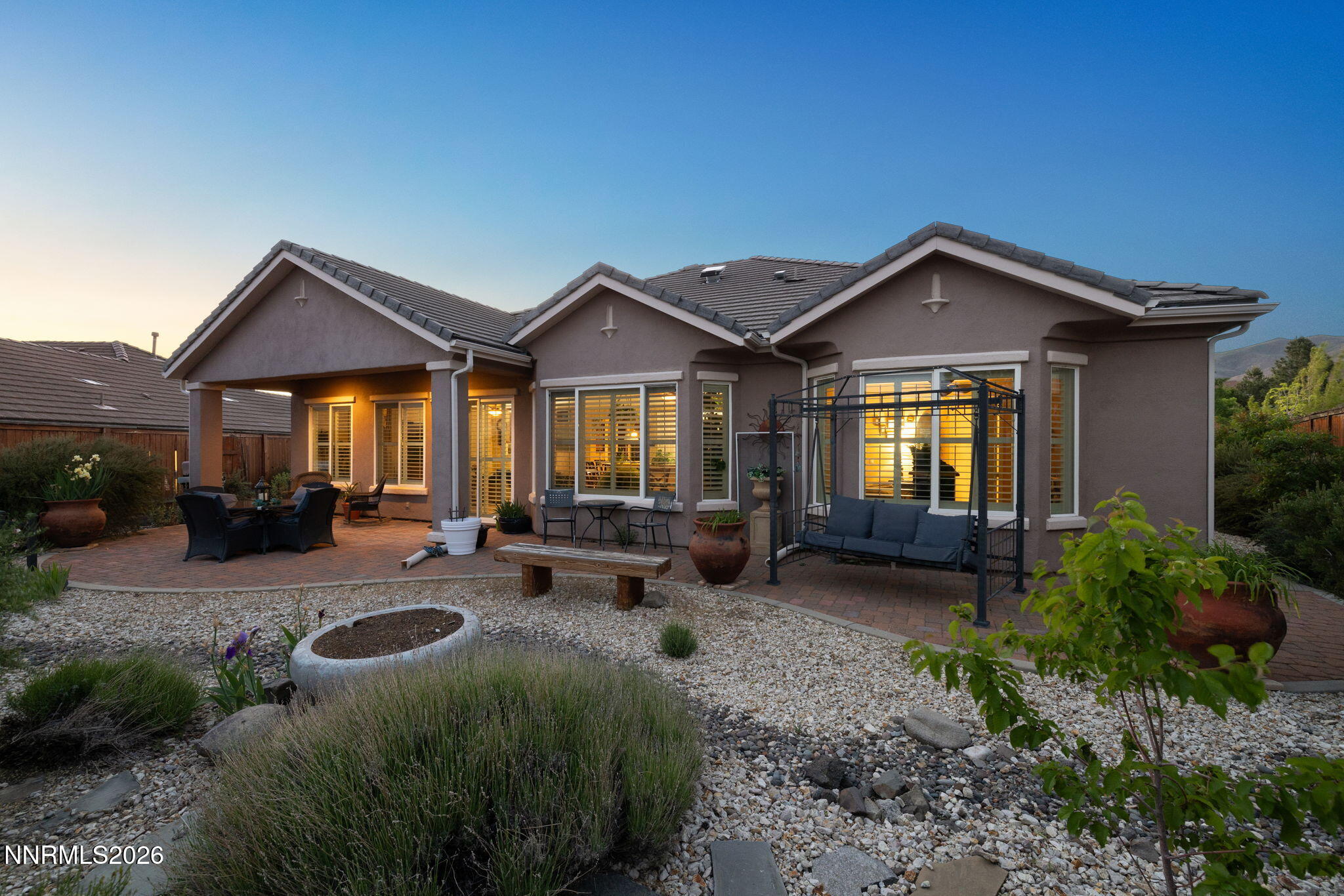 9160 Quilberry Way Reno, NV 89523 - Photo 2 of 53 a view of a house with a bed and wooden fence