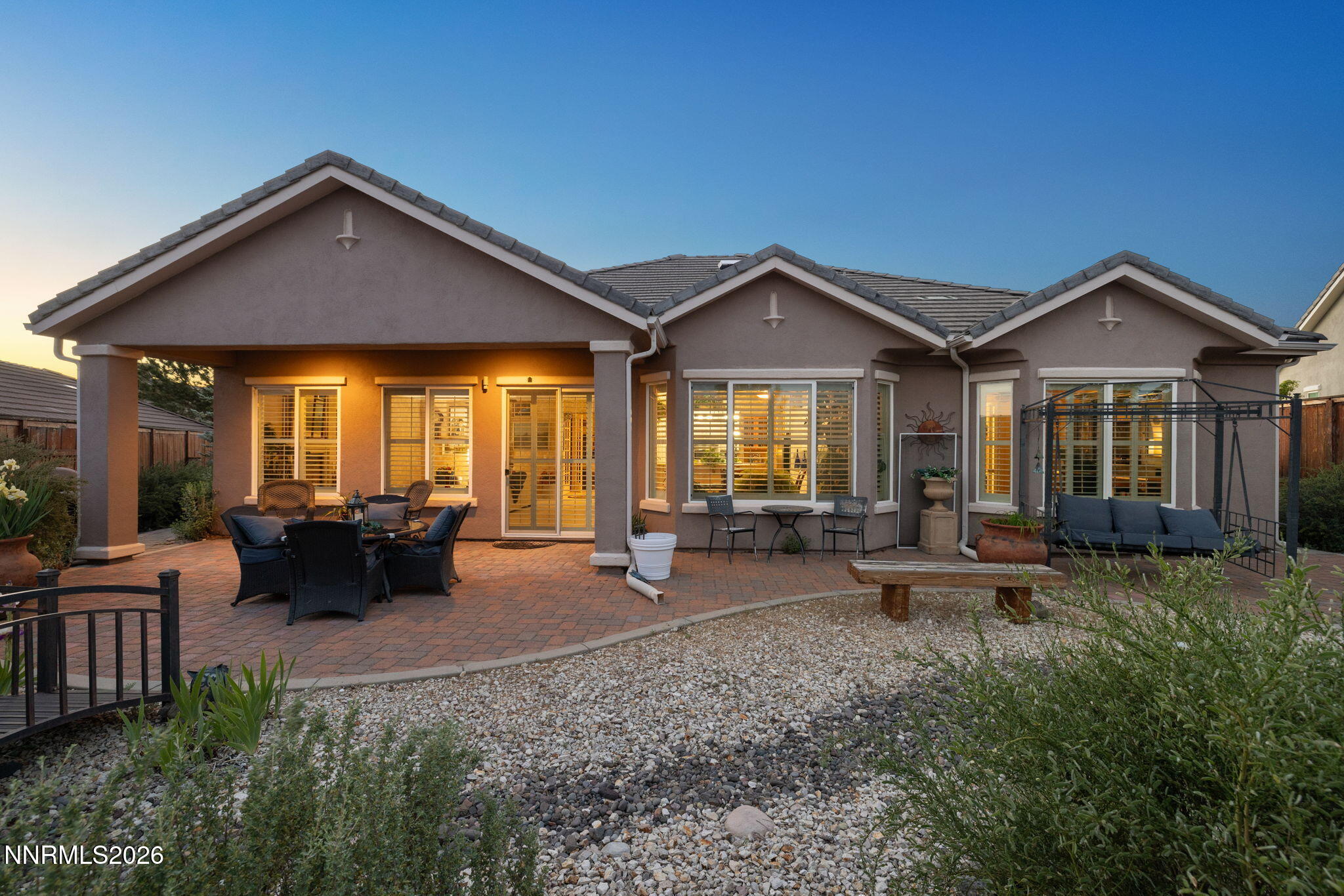 9160 Quilberry Way Reno, NV 89523 - Photo 3 of 53 a front view of a house with patio