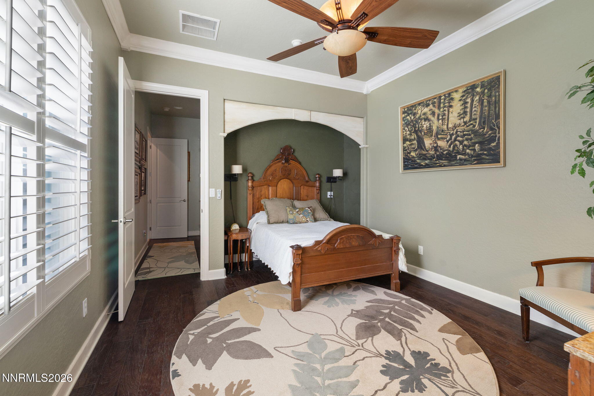 9160 Quilberry Way Reno, NV 89523 - Photo 36 of 53 a bedroom with a bed and a chandelier