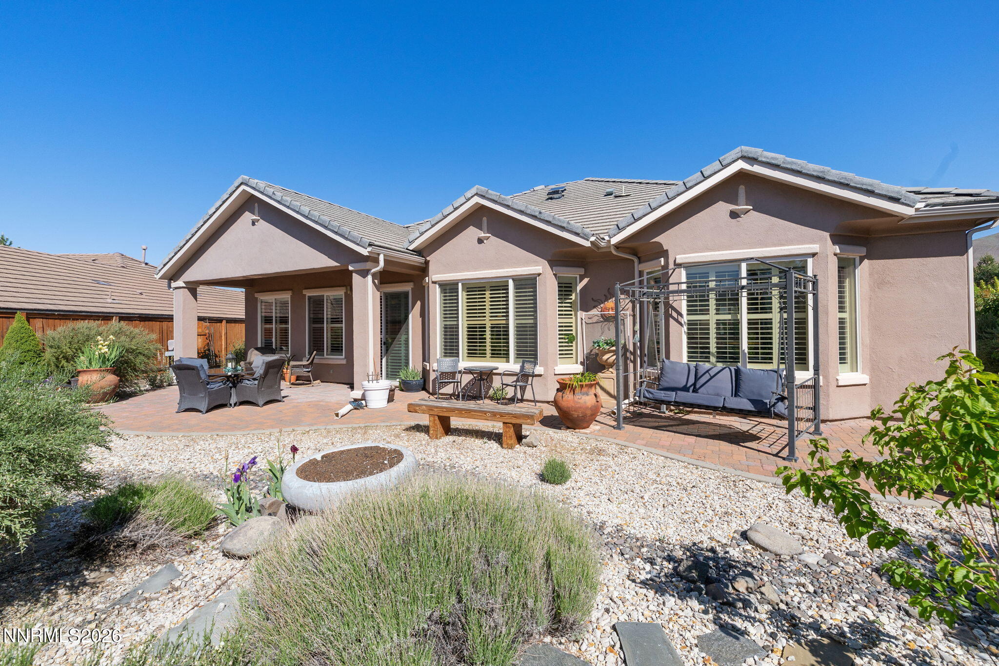 9160 Quilberry Way Reno, NV 89523 - Photo 51 of 53 a front view of a house with yard patio and swimming pool