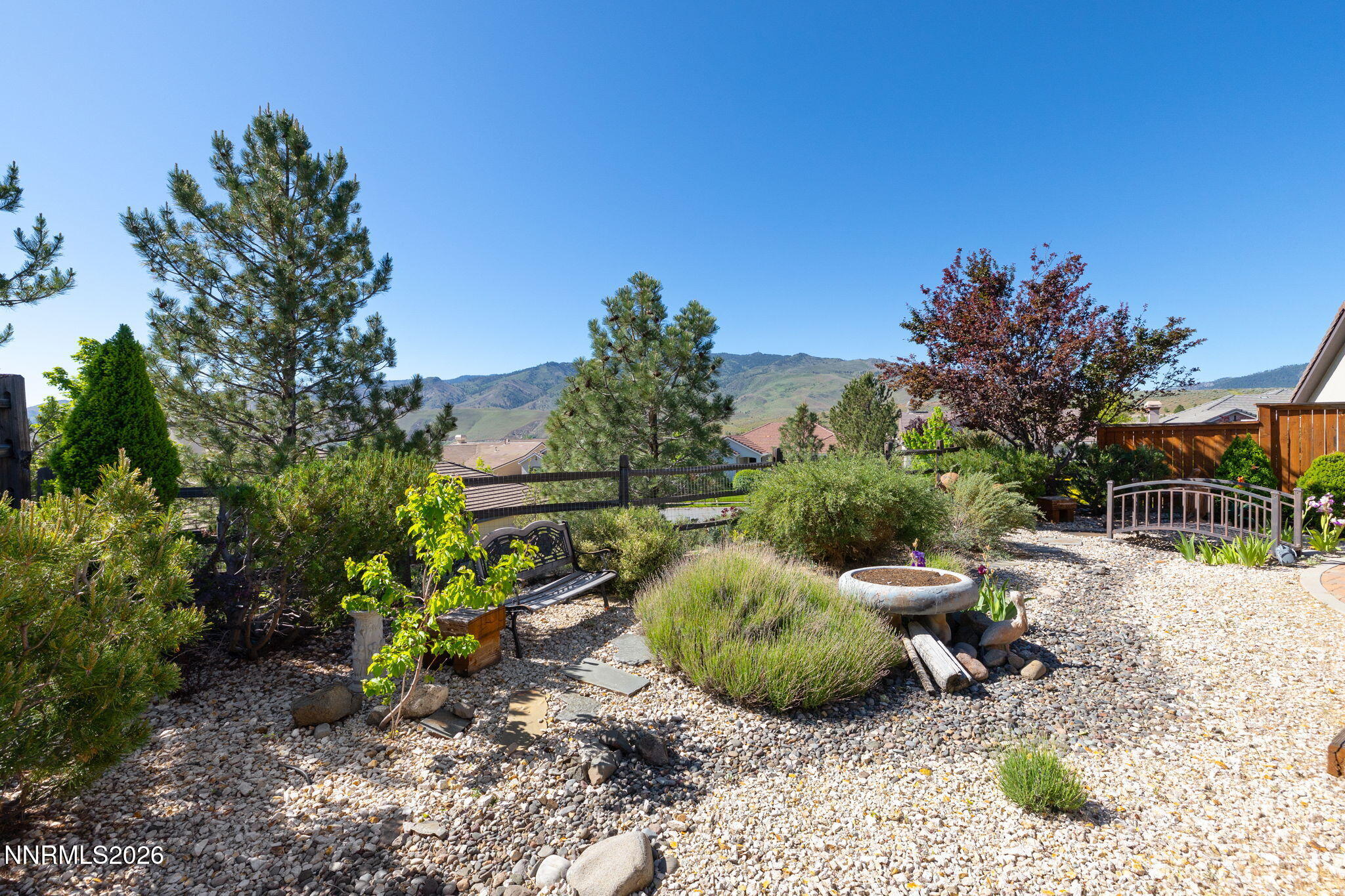 9160 Quilberry Way Reno, NV 89523 - Photo 52 of 53 a view of a backyard with chair and potted plants