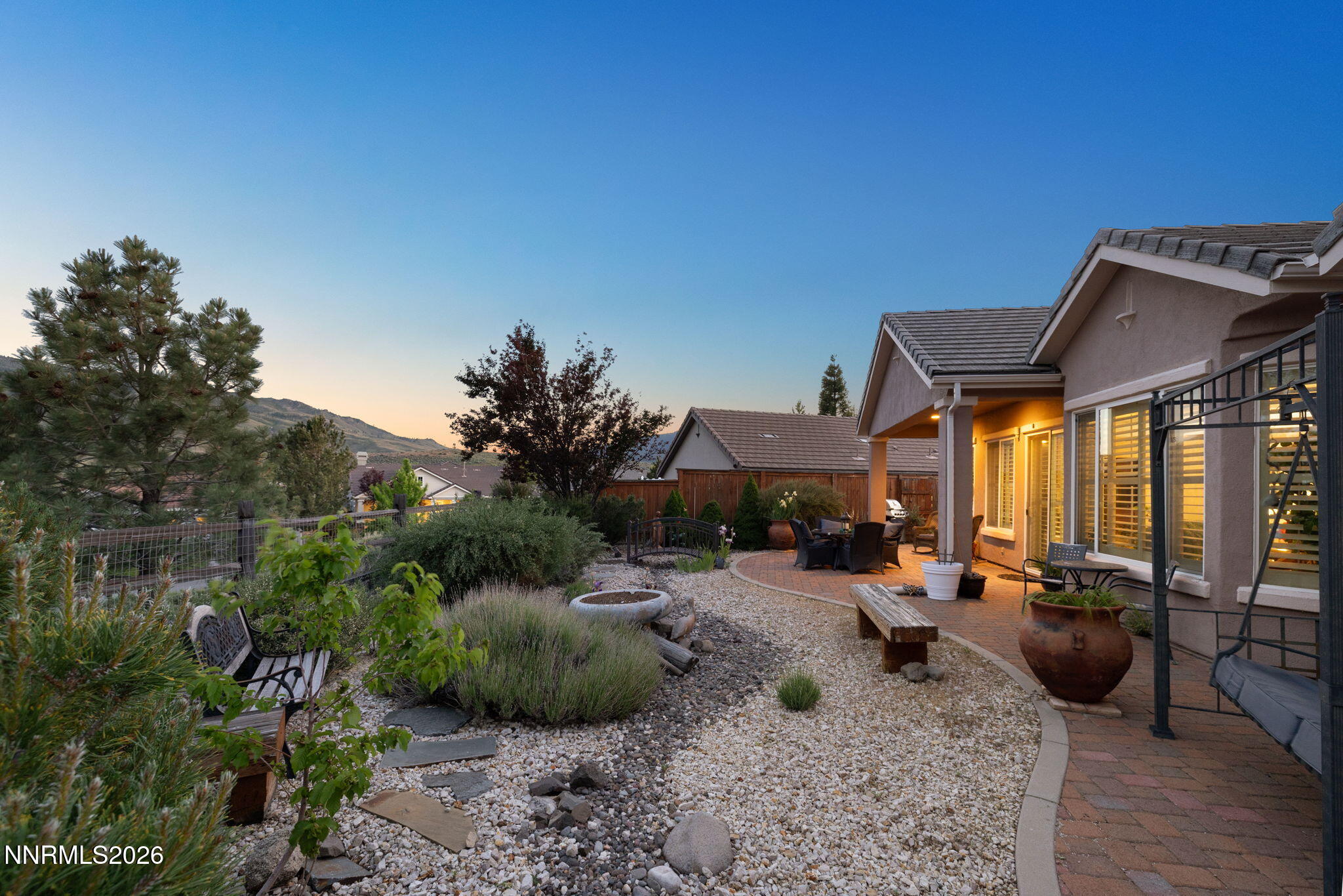 9160 Quilberry Way Reno, NV 89523 - Photo 8 of 53 a view of a house with backyard outdoor seating area and furniture